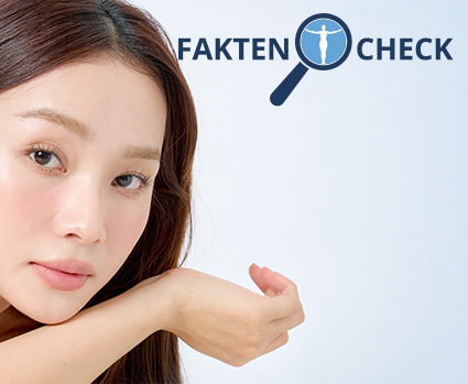 Asiatisches Model mit glatter, praller Haut stützt ihren Kopf